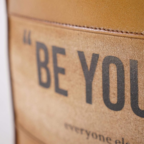 Industriële poef in leer "Be Yourself"