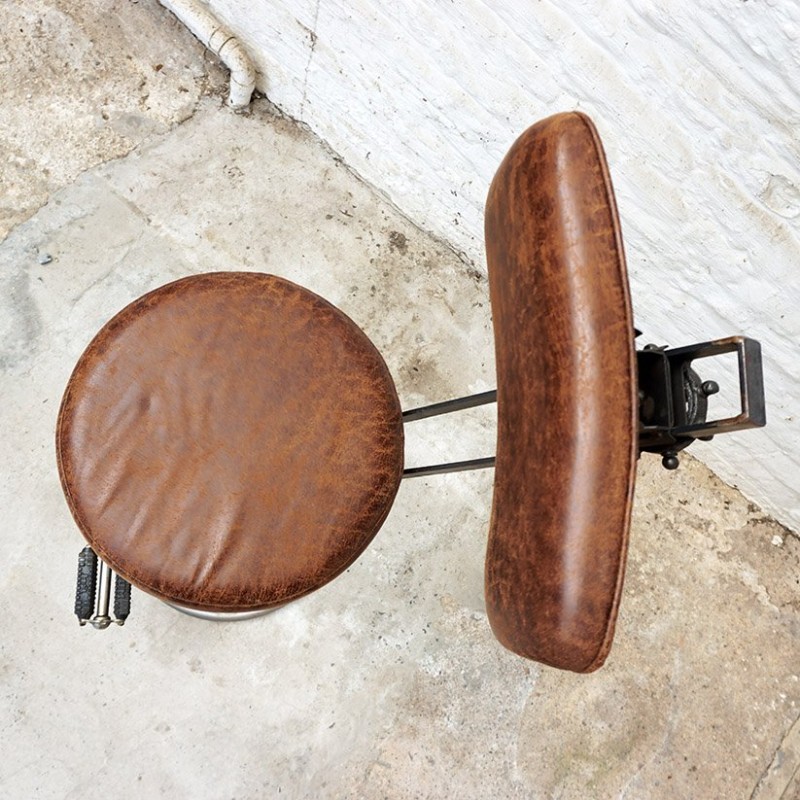 Industriële barkruk met pedalen en rugleuning