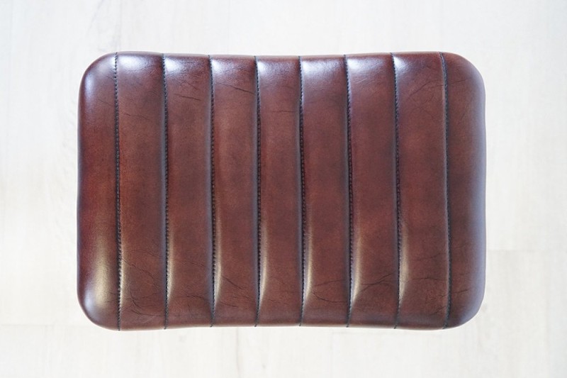 Hoge kruk in natuurlijk leer en metaal